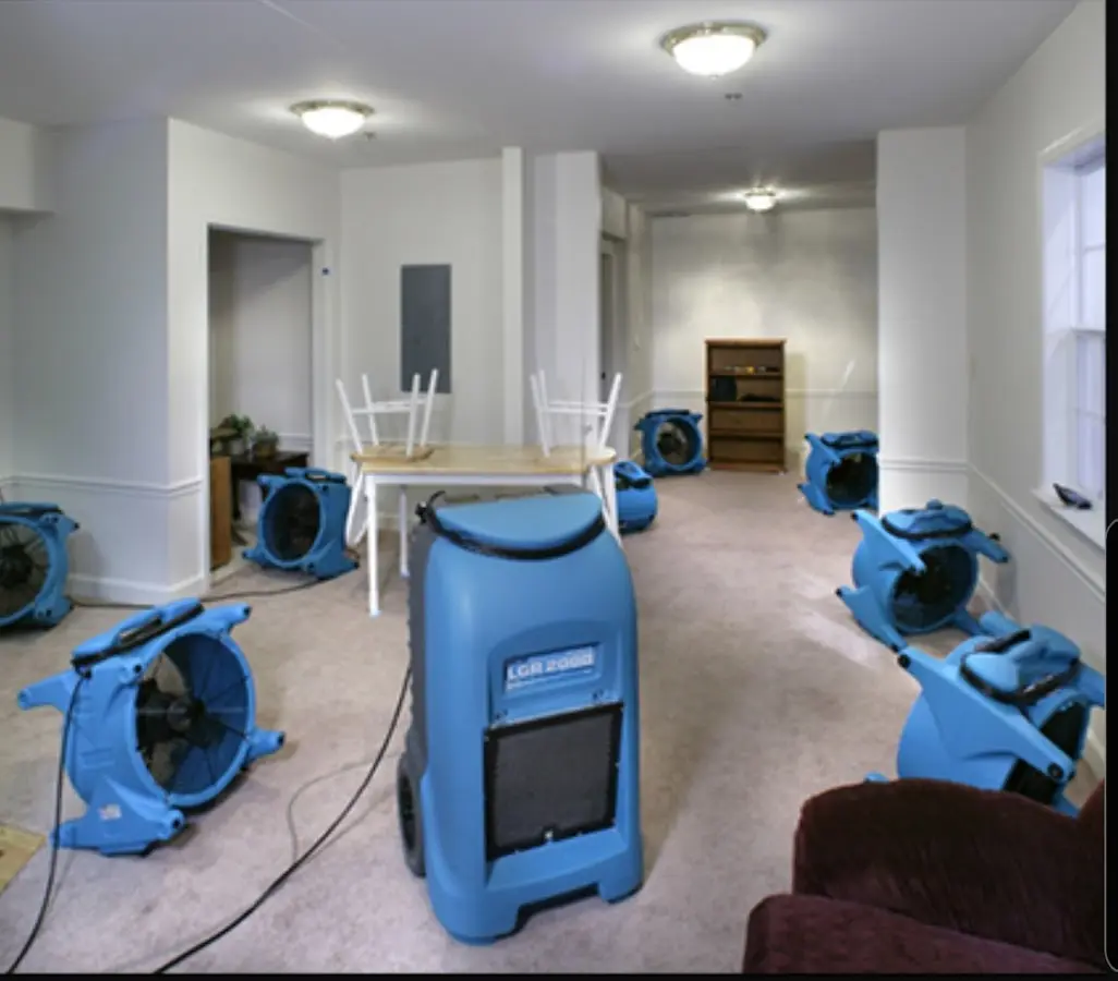 Air movers and dehumidifier setup for Water Damage Restoration in Rushville